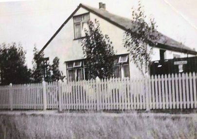 Poplars bungalow Keer Avenue with its pickett fence