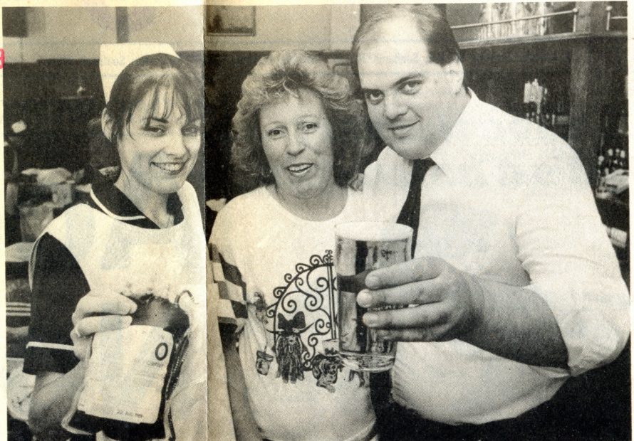 Cheers: Sister Paula Foster holds a pint of blood taken from pub manageress Eunice Robinson, centre, while Garry Robinson prefers a more traditional pint.