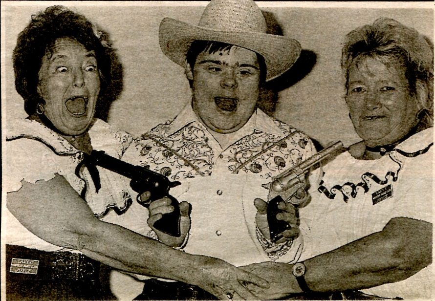 Hands up: Jamie Dixon, 21, of Canvey, gets the drop on Joyce Hayward and Joyce Taylor of the Lazy C Western Dance Club at the Phoenix Club, Canvey.