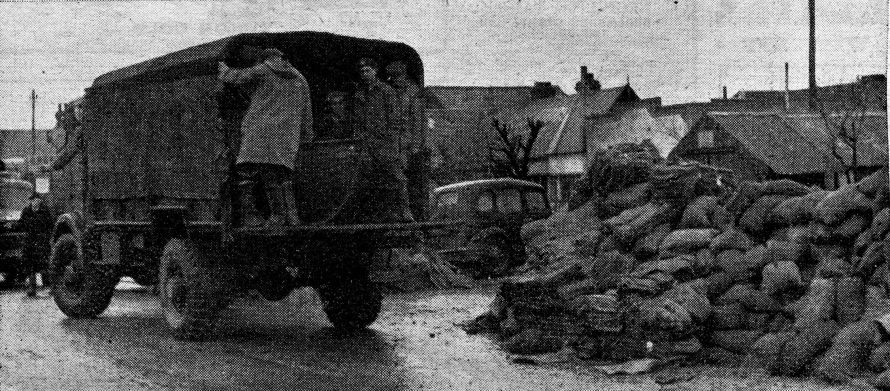 Army lorries delivered thousands of sandbags to flooded Canvey. They were hurriedly filled by an army of soldiers and civilians .and used to repair the damaged sea wall.