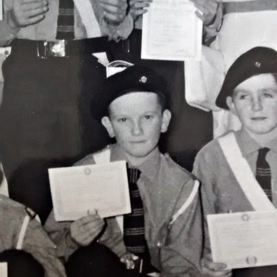 A very young Gary getting his certificate