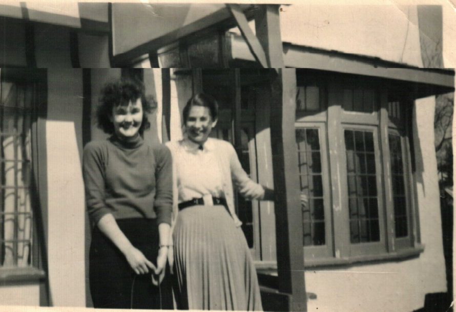 Eunice and friend at the entrance to the guesthouse. | Freda Feber