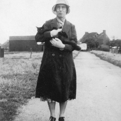 Ada Deadman in road in front of Chase cottages with Brick house Farm in background | Joyce Cowell