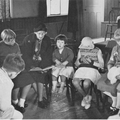 Ethel Allbut with children inside St Anne's Church. Sunday School? Can you name the children