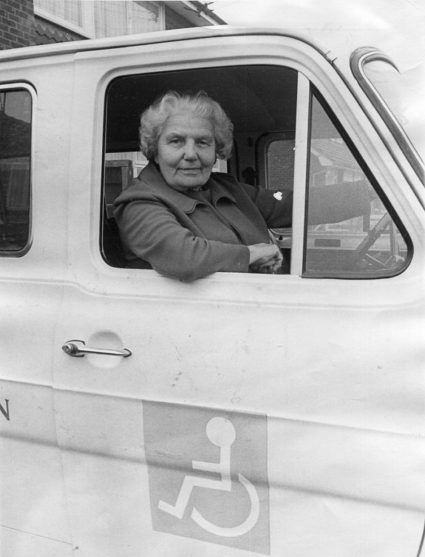 Madge Moore at the wheel of the disabled association van. Dated Jan 1975 | Echo Newspaper Archive