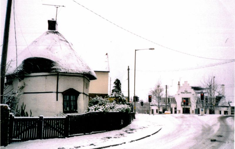 Haven Road with 1621 Dutch Cottage. King Canute pub in background in the snow. | Wendy Knight
